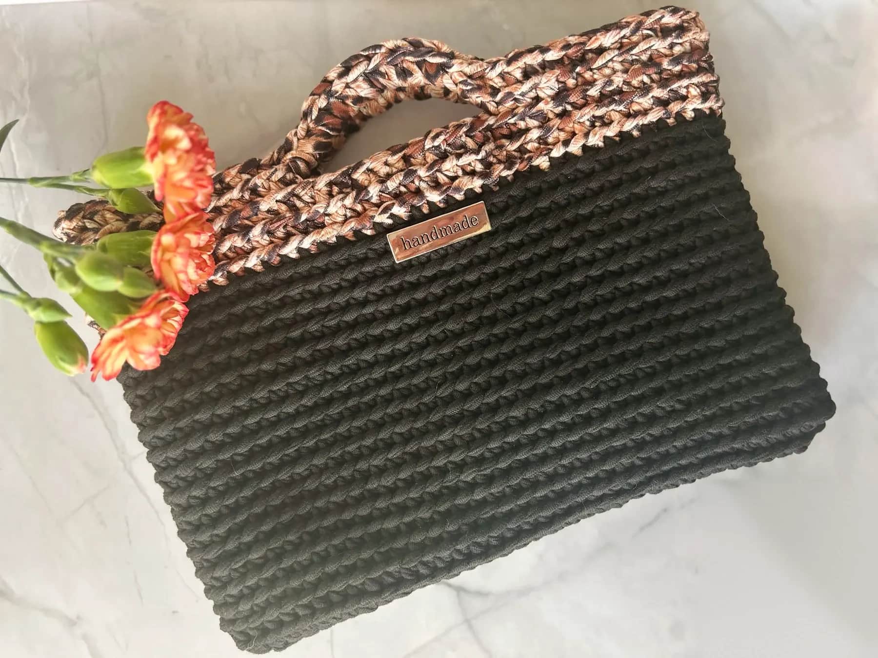 Black Twist clutch with copper-brown twisted crochet top and handles handmade by Ali